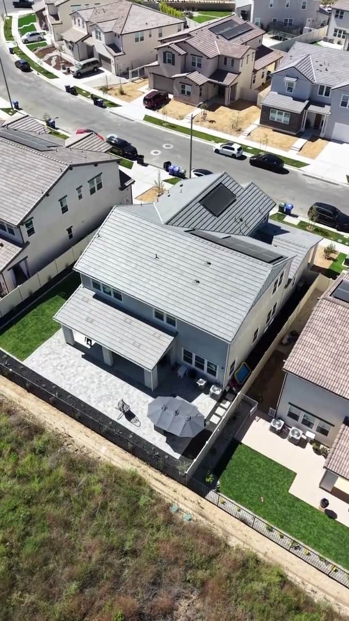 Top-down aerial view of a new-home lot with a completed backyard by Five Stars Builders