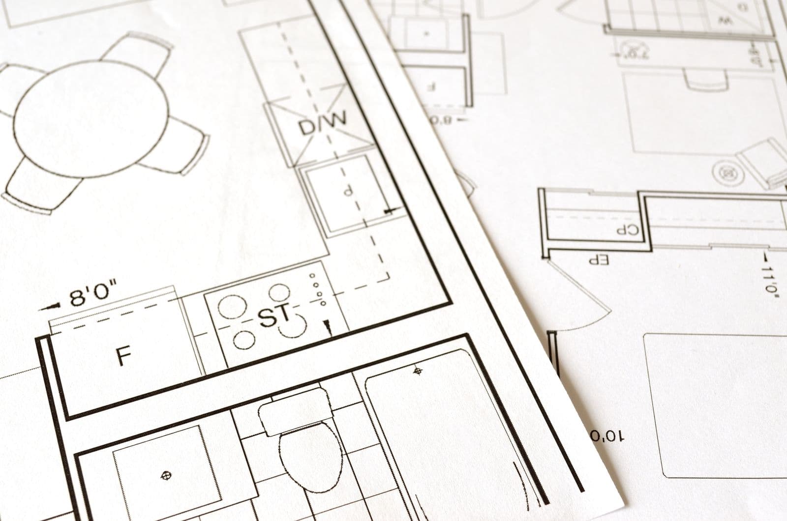 Backyard design blueprint laid out over a bare new-construction lot