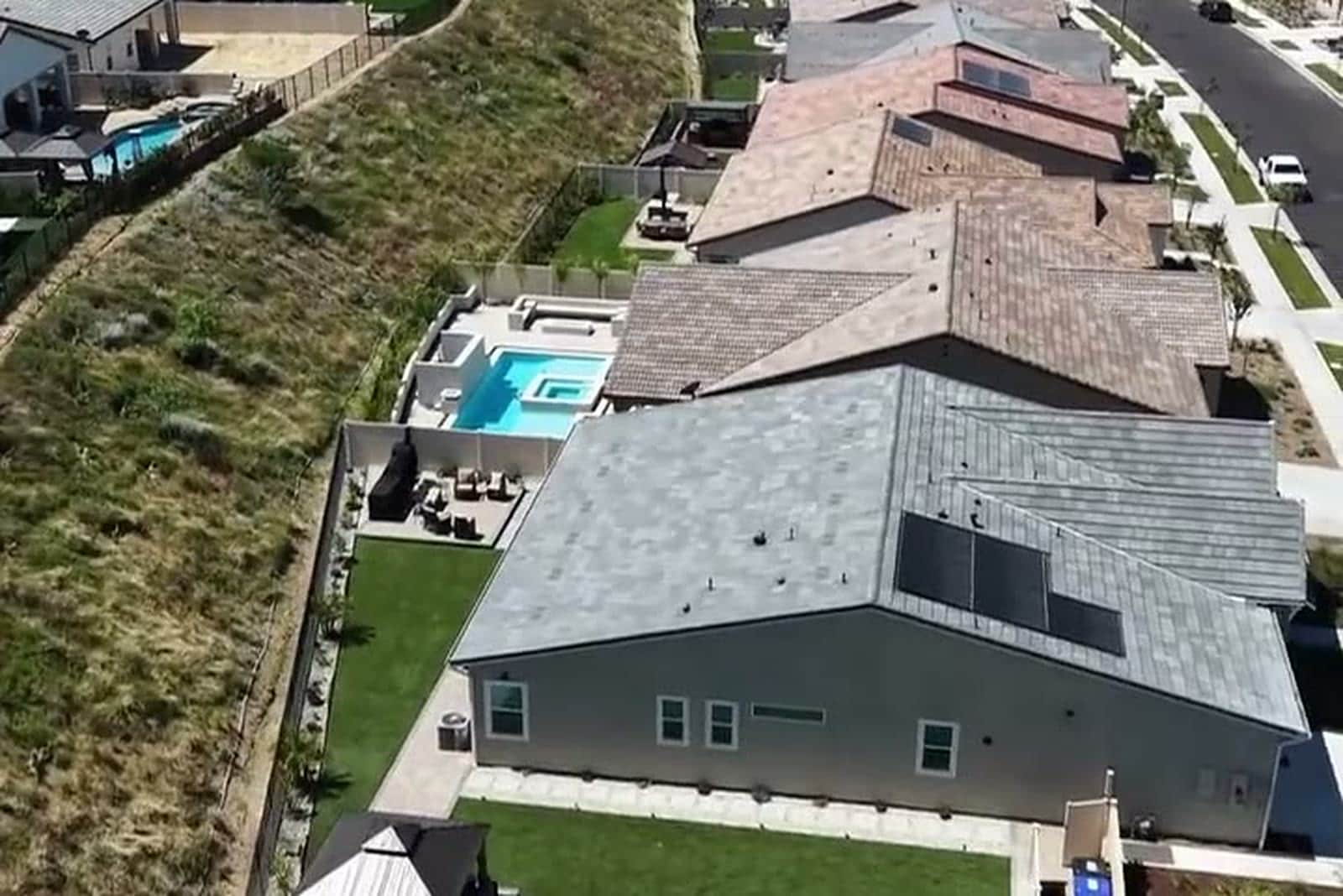 Aerial view of a completed Southern California backyard with pool in a new-home community served by Five Stars Builders