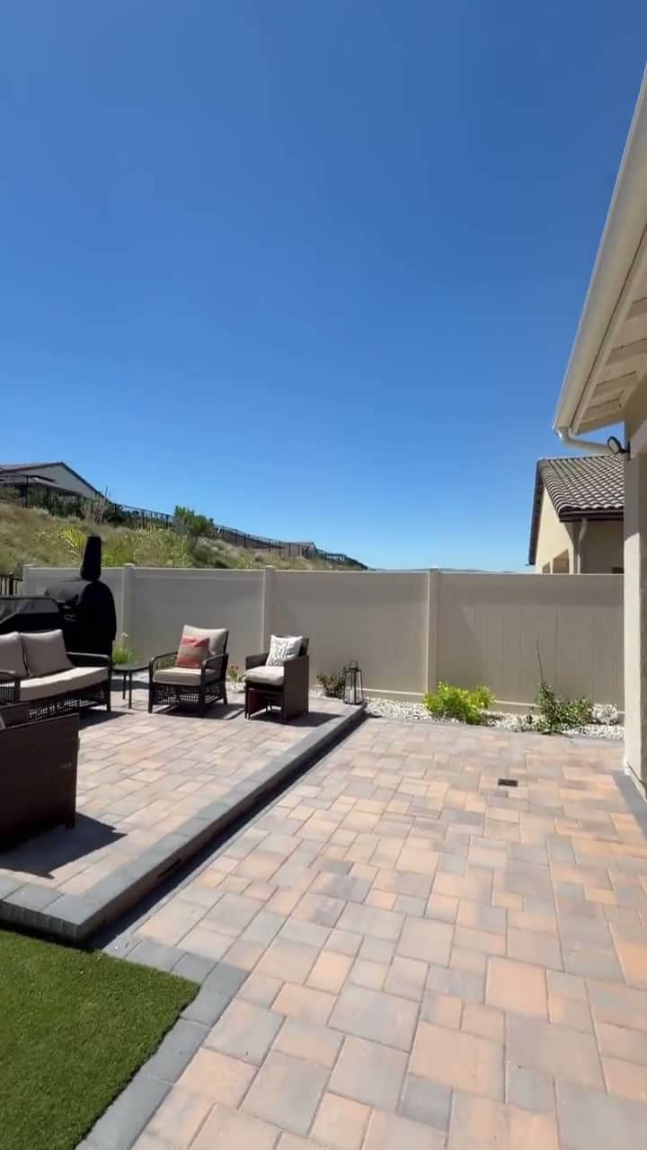 Finished paver patio with outdoor seating by Five Stars Builders
